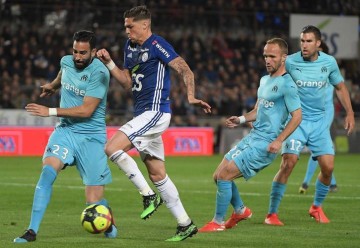 法甲争冠关键战:里尔主场强攻,马赛客场逆袭?